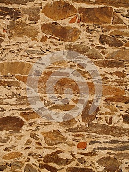 Rustic stone and sand wall