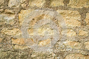 Rustic Stone Wall Background with Weathered Texture and Visible Mortar Details