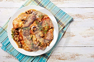 Rustic style of Chicken Marsala on a plate