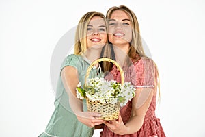 Rustic style girls gathering flowers together. Flowers shop. Natural fragrance. Friendship and love. Women and flowers