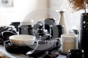 Rustic table setting with empty craft handmade ceramic tableware