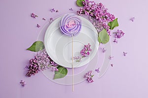 Rustic table setting with lilac flowers on light table. Holidays decoration on Provence style. Romantic dinner. Flat lay with copy