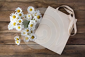 Rustic tote bag mockup with daisy