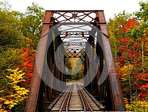 Rustic train trestle in New Hampshire autumn