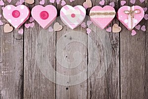 Rustic Valentines Day top border with pink heart-shaped gift boxes