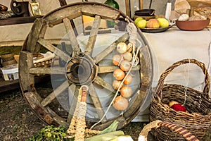 Rustic vintage autumn, fall background with wooden cart wheel