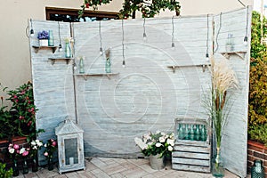 Rustic and vintage wedding backdrop idea made from old oriented strand board wood