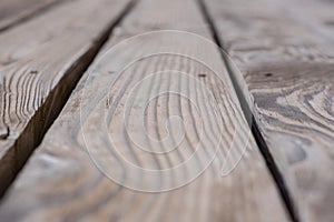 Rustic weathered barn wood background with knots and nail holes