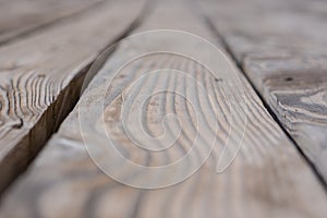 Rustic weathered barn wood background with knots and nail holes