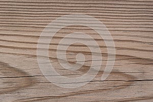 Rustic weathered barn wood background with knots and nail holes.