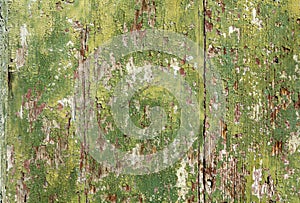 Rustic and weathered paint on wood panel photo