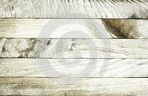 Rustic weathered wood background with grain and knots - wood texture