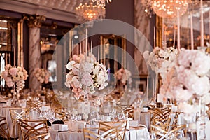 Rustic wedding decorations with flowers and candles. banquet decor.