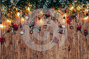 Rustic wedding photo zone. Hand made wedding decorations includes Photo Booth red flowers.