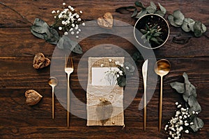 Rustic Wedding. Vintage gold cutlery with eucalyptus