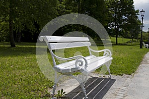 Rustic white bench in park