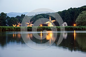 Rustic windmills by night