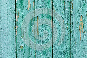 Rustic wood texture or background with scratched turquoise paint