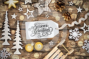 Rustic Wooden Christmas Background, Bokeh, Label With Text Seasons Greetings
