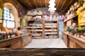 Rustic Wooden Counter with Blurred Pharmacy Interior ideal for product presentations or mockups