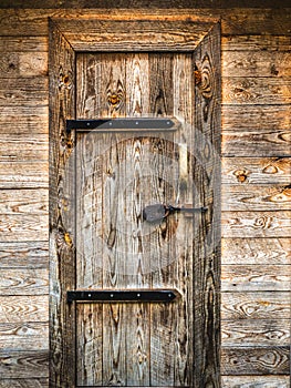 Rustic Wooden Door with Metal Hinges