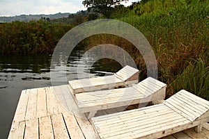 Rustic Wooden Lake Lounge Chairs