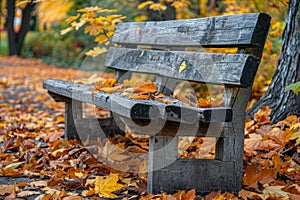 Rustic wooden park bench surrounded by vibrant autumn leaves in a peaceful park. AI generated.