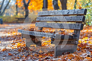 Rustic wooden park bench surrounded by vibrant autumn leaves in a peaceful park. AI generated.