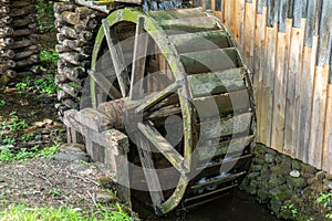 Rustic wooden water wheel on farm