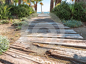 Rustic wooden way to the Mediterranean sea in Larnaca