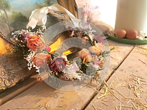 Rustic Wreath of Flowers on Wooden Table with Old Painting in Antique Frame, Floristry Aesthetic Farmhouse Countryside Farm Attic