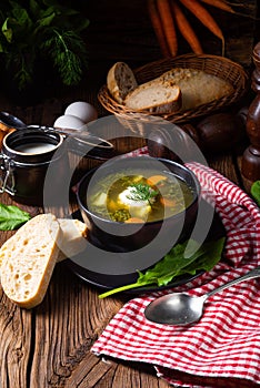 A Rustikal Sorrel soup with potatoes and cream photo