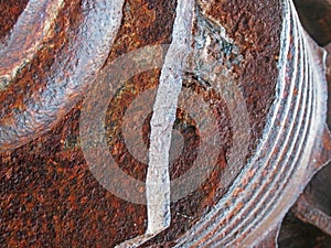 rusting brown steel machinery with rough texture abstract background