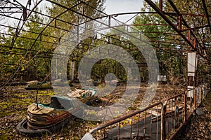 Rusting derelict bumper cars at Pripyat, Chernobyl