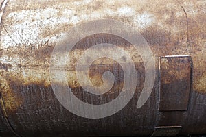 Rusting iron tank. Abstract industrial background