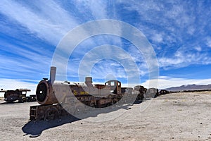 Rusting locomotive engines in the Cemeterio de Trenes Train Cemetery, Uyuni, Potosi department, Bolivia photo