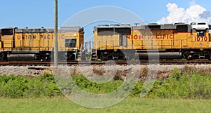 Rusted Freight Train on Railroad Tracks