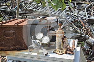 Rusting tools in junkyard