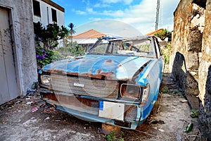 Rusty abandoned car