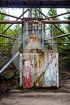 Rusty abandoned lift to the top of duga in Pripyat