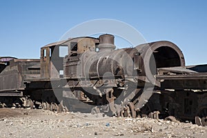 Rusty and abandoned old trains at the Train Cemetery Cementerio de Trenes in Uyuni desert, Bolivia