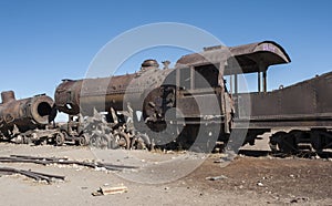 Rusty and abandoned old trains at the Train Cemetery Cementerio de Trenes in Uyuni desert, Bolivia photo
