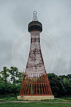 Rusty abandoned water tower. First hyperboloid of engineer Shukhov