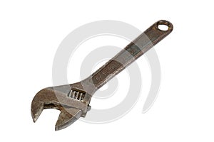 Rusty adjustable wrench on white background