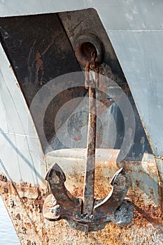 Rusty anchor on old ship