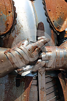 Rusty armor and medieval sword of a soldier of Kings