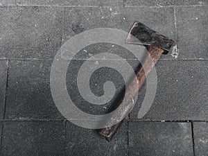 Rusty ax on the floor