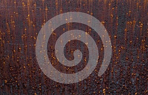 Rusty background. Old rusty metal sheet. Red rusted wall of the garage. Brown Grunge texture.