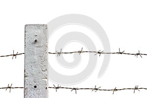 Rusty barbed wire fence isolated on white background.
