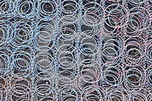 Rusty bed springs burned in a fire